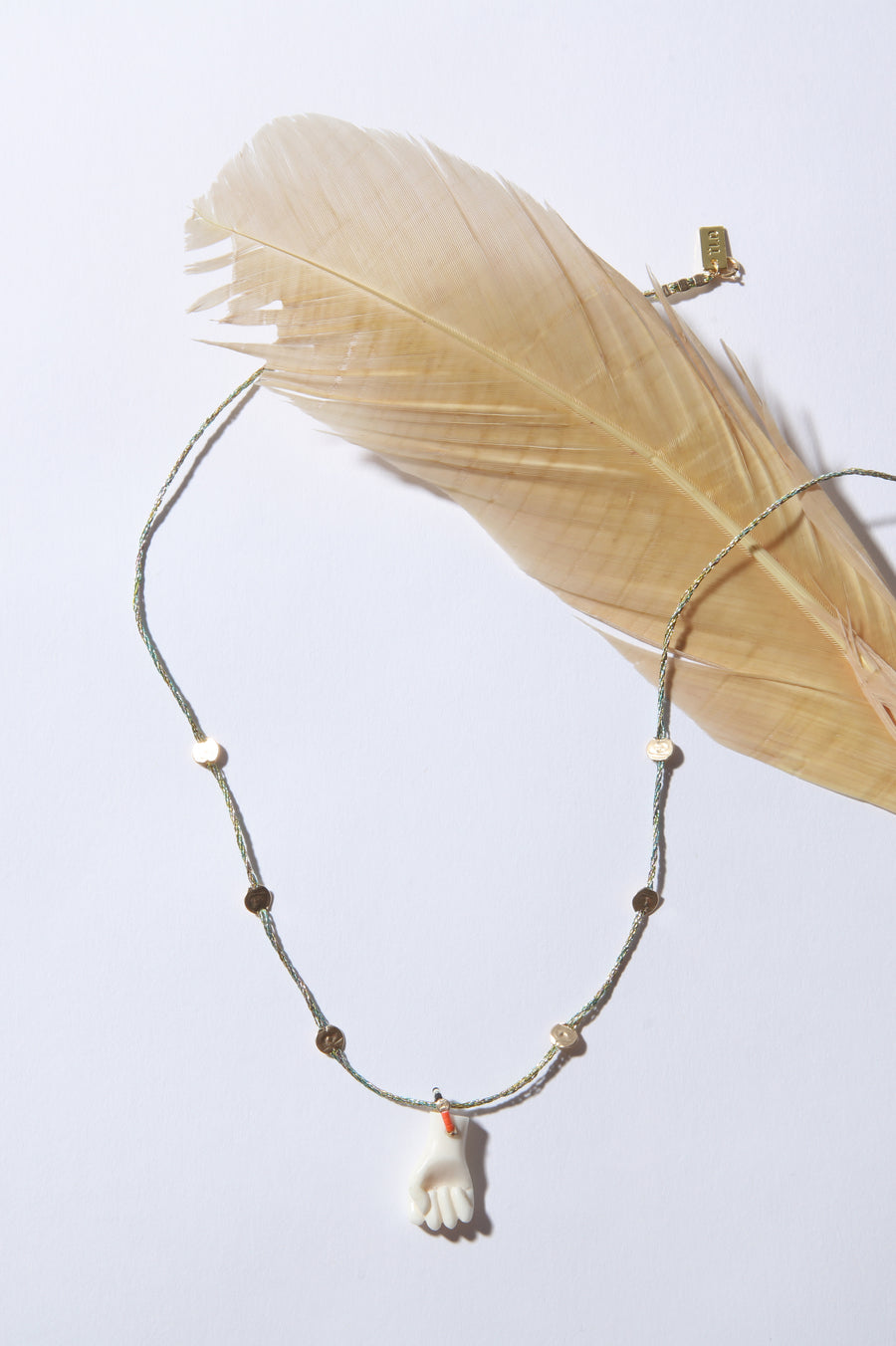 Sagrado Necklace - Fist on Metallic String